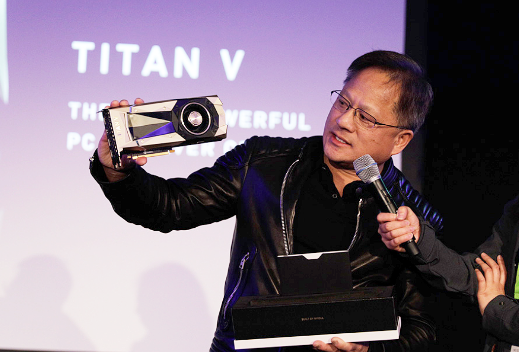 NIPS에서 볼타(NVIDIA Volta)기반의 강력한 PC용 GPU인 타이탄 V(TITAN V)를  CEO인 젠슨 황(Jensen Huang)이 직접 공개하는 모습(사진:엔비디아)